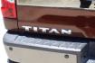2017 Orange Nissan TITAN Platinum Reserve (1N6AA1E61HN) with an Endurance 5.6L V-8 gasoline direct injection engine, located at 2401 E Main St., Grand Prairie, TX, 75050, (972) 262-4440, 32.748981, -96.969643 - Photo#5