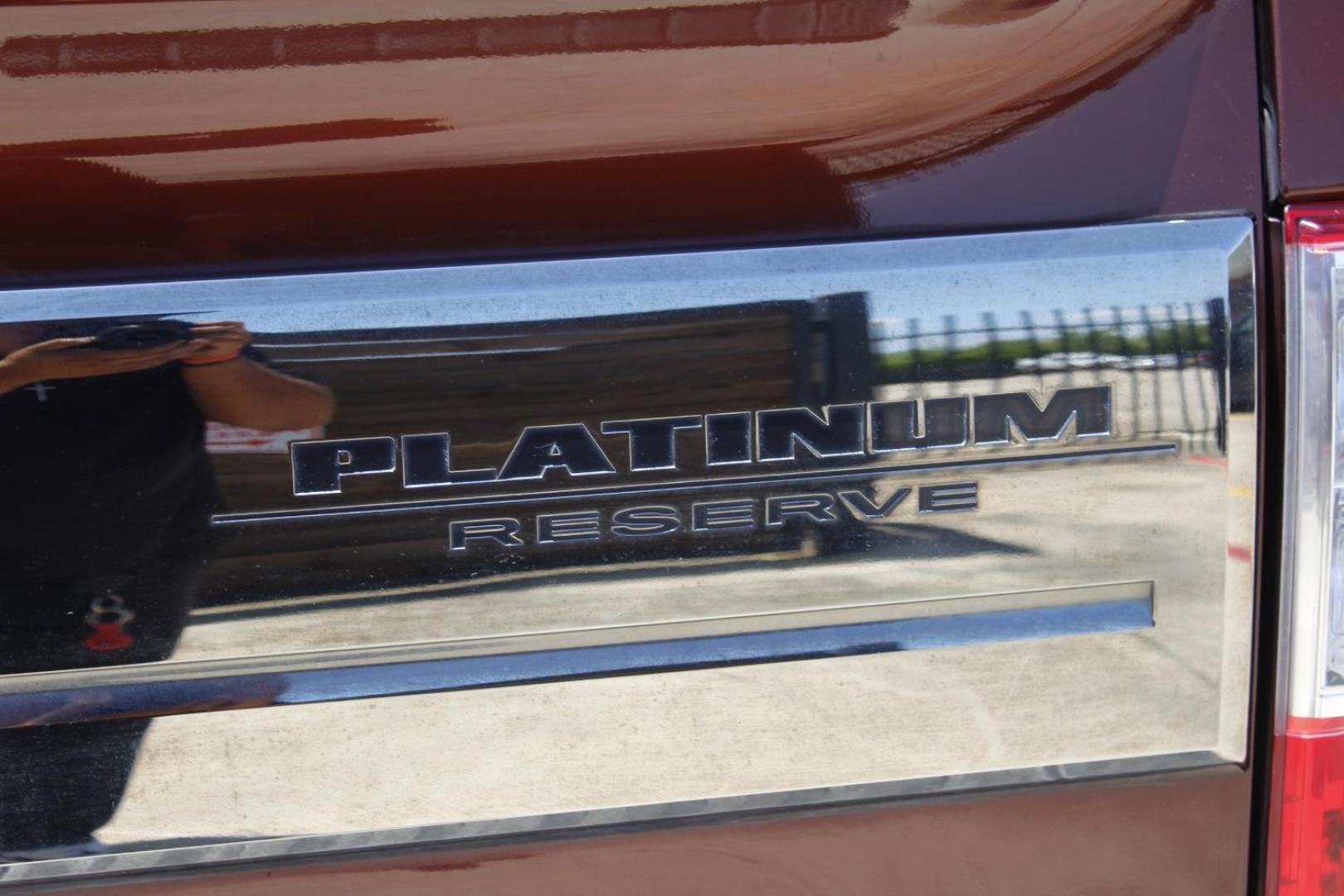 2017 Orange Nissan TITAN Platinum Reserve (1N6AA1E61HN) with an Endurance 5.6L V-8 gasoline direct injection engine, located at 2401 E Main St., Grand Prairie, TX, 75050, (972) 262-4440, 32.748981, -96.969643 - Photo#8