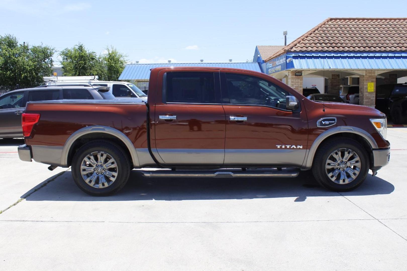 2017 Orange Nissan TITAN Platinum Reserve (1N6AA1E61HN) with an Endurance 5.6L V-8 gasoline direct injection engine, located at 2401 E Main St., Grand Prairie, TX, 75050, (972) 262-4440, 32.748981, -96.969643 - Photo#9