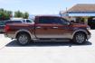 2017 Orange Nissan TITAN Platinum Reserve (1N6AA1E61HN) with an Endurance 5.6L V-8 gasoline direct injection engine, located at 2401 E Main St., Grand Prairie, TX, 75050, (972) 262-4440, 32.748981, -96.969643 - Photo#9