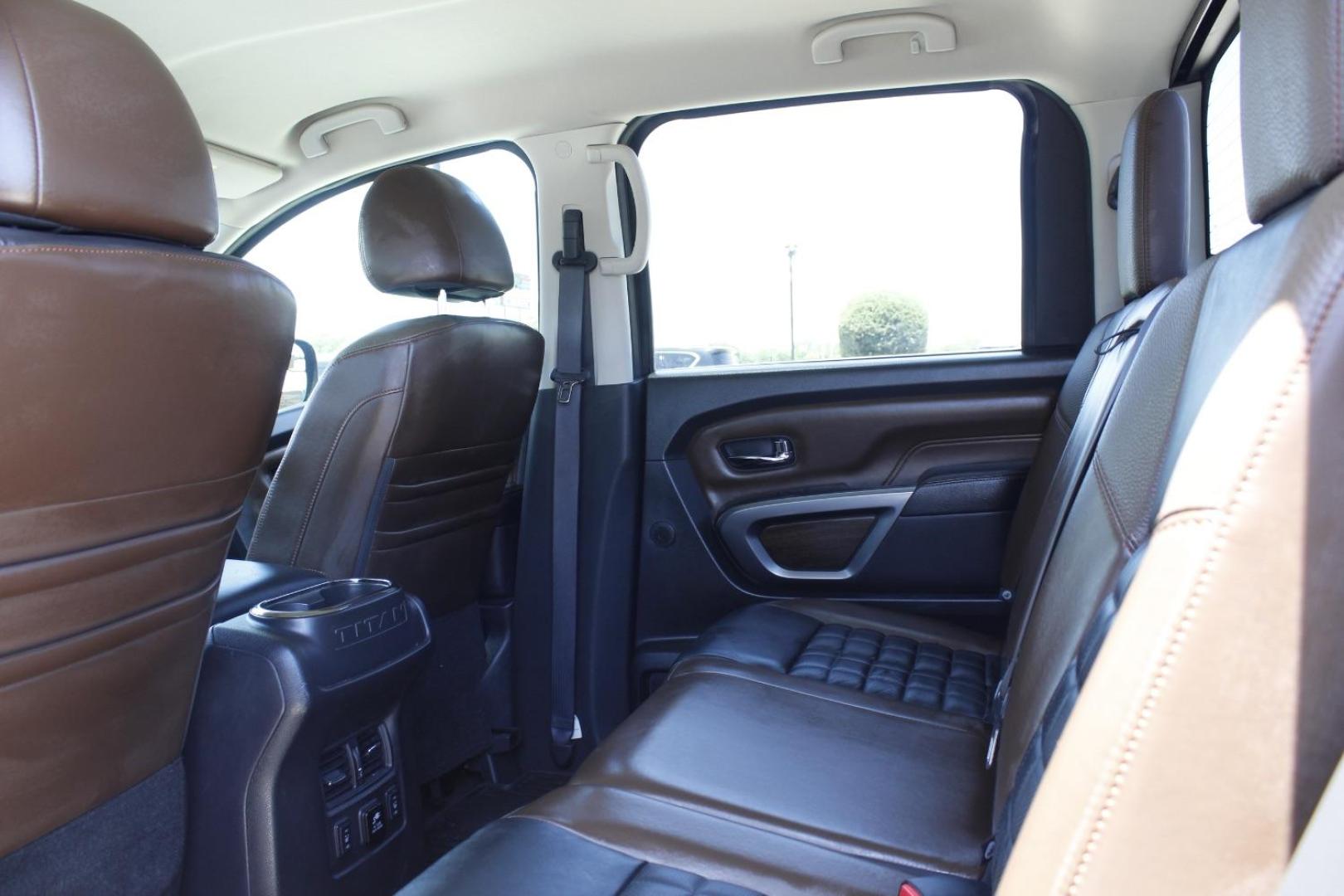 2017 Orange Nissan TITAN Platinum Reserve (1N6AA1E61HN) with an Endurance 5.6L V-8 gasoline direct injection engine, located at 2401 E Main St., Grand Prairie, TX, 75050, (972) 262-4440, 32.748981, -96.969643 - Photo#13