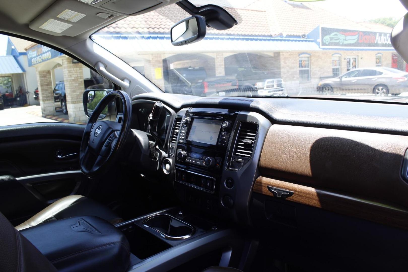 2017 Orange Nissan TITAN Platinum Reserve (1N6AA1E61HN) with an Endurance 5.6L V-8 gasoline direct injection engine, located at 2401 E Main St., Grand Prairie, TX, 75050, (972) 262-4440, 32.748981, -96.969643 - Photo#14