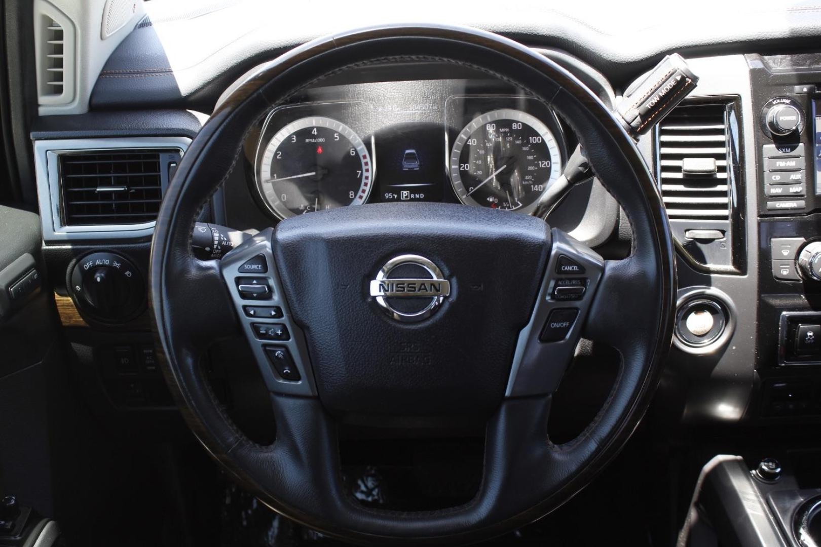 2017 Orange Nissan TITAN Platinum Reserve (1N6AA1E61HN) with an Endurance 5.6L V-8 gasoline direct injection engine, located at 2401 E Main St., Grand Prairie, TX, 75050, (972) 262-4440, 32.748981, -96.969643 - Photo#21