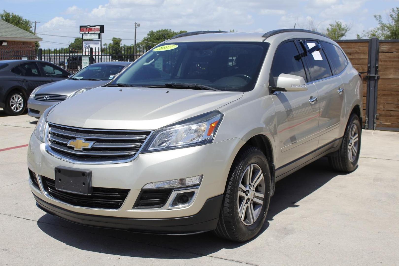 2017 Gold Chevrolet Traverse 2LT (1GNKRHKD0HJ) with an 3.6L V-6 gasoline direct injection engine, located at 2401 E Main St., Grand Prairie, TX, 75050, (972) 262-4440, 32.748981, -96.969643 - Photo#1