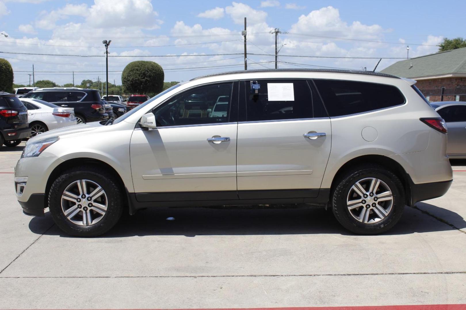 2017 Gold Chevrolet Traverse 2LT (1GNKRHKD0HJ) with an 3.6L V-6 gasoline direct injection engine, located at 2401 E Main St., Grand Prairie, TX, 75050, (972) 262-4440, 32.748981, -96.969643 - Photo#2