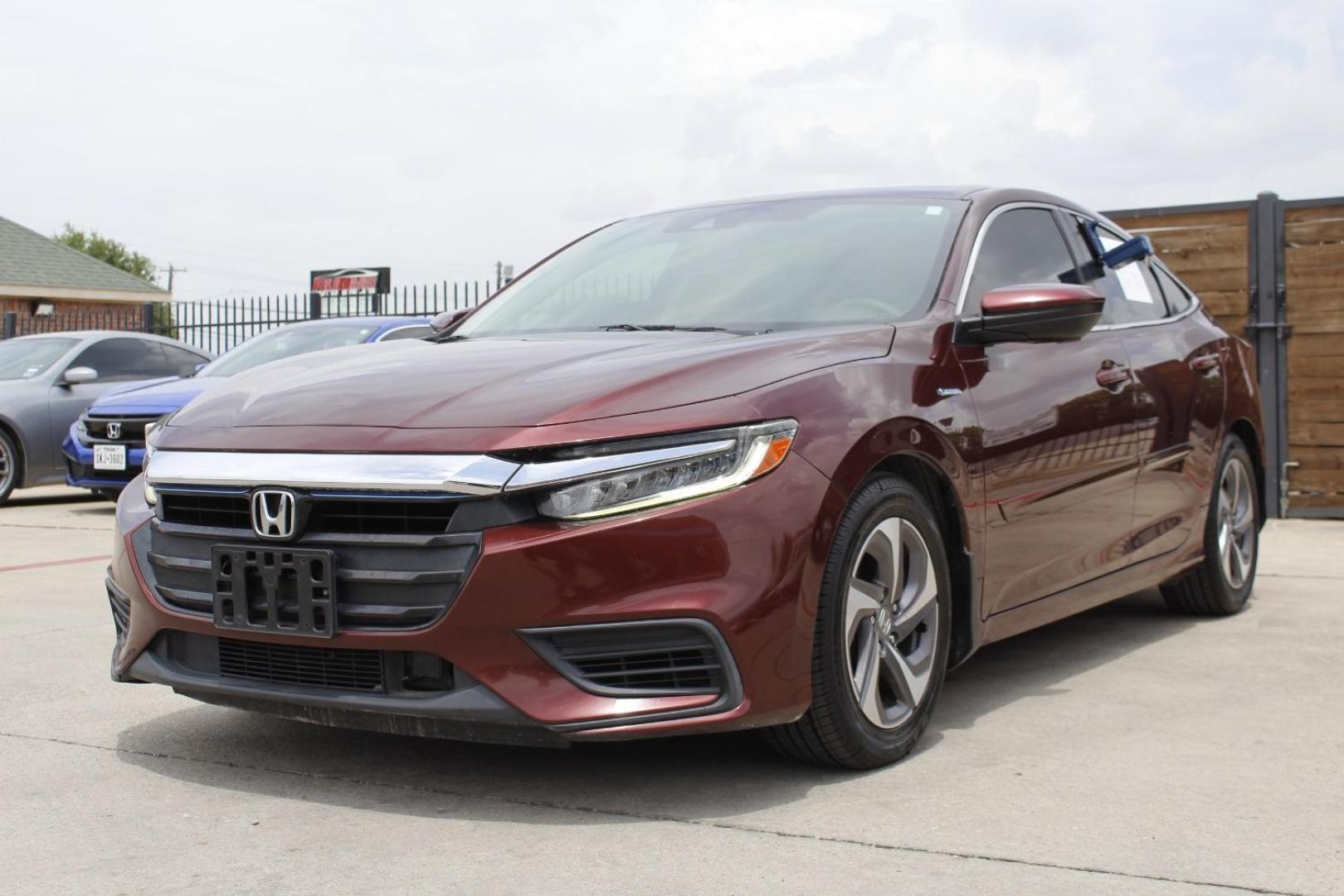 2019 Red Honda Insight LX (19XZE4F14KE) with an 1.5L I-4 DOHC engine, located at 2401 E Main St., Grand Prairie, TX, 75050, (972) 262-4440, 32.748981, -96.969643 - Photo#1