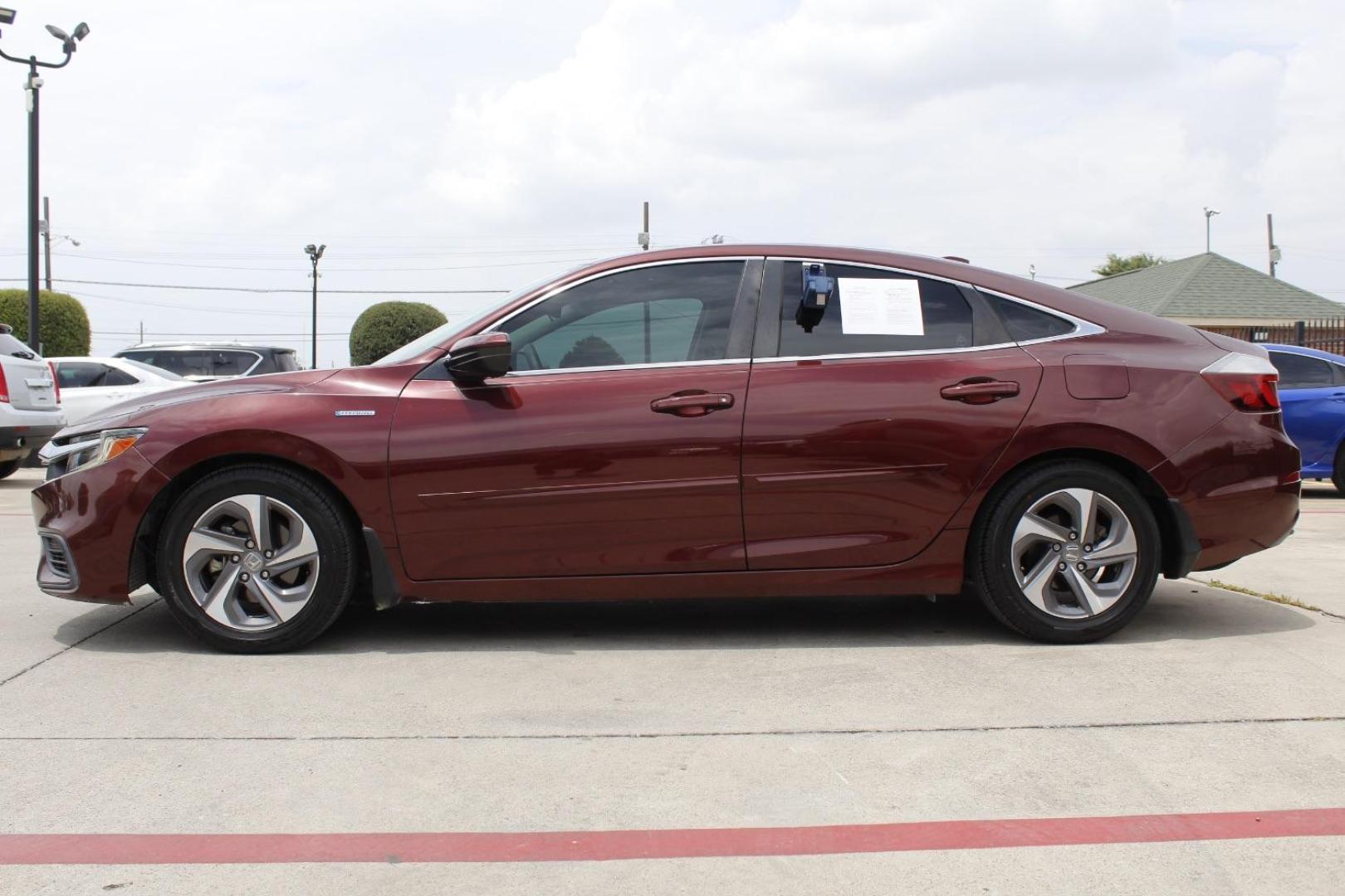 2019 Red Honda Insight LX (19XZE4F14KE) with an 1.5L I-4 DOHC engine, located at 2401 E Main St., Grand Prairie, TX, 75050, (972) 262-4440, 32.748981, -96.969643 - Photo#2