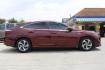 2019 Red Honda Insight LX (19XZE4F14KE) with an 1.5L I-4 DOHC engine, located at 2401 E Main St., Grand Prairie, TX, 75050, (972) 262-4440, 32.748981, -96.969643 - Photo#9