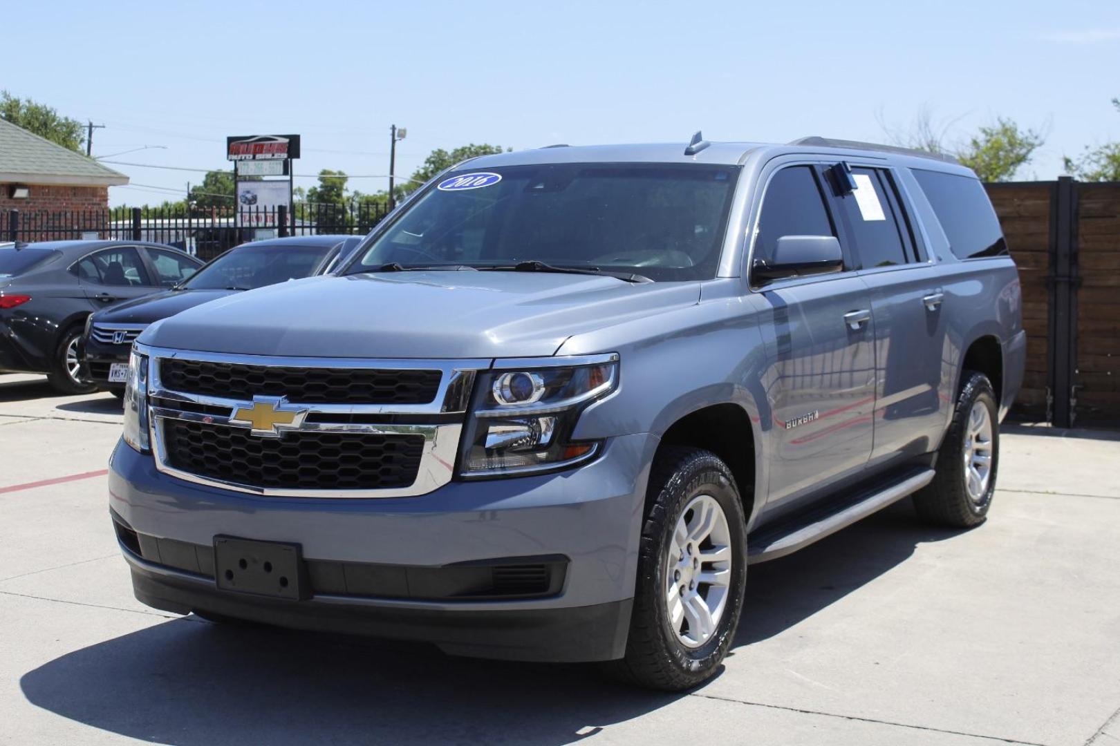 2016 Gray Chevrolet Suburban LT (1GNSCHKCXGR) with an EcoTec3 5.3L V-8 gasoline direct injection engine, located at 2401 E Main St., Grand Prairie, TX, 75050, (972) 262-4440, 32.748981, -96.969643 - Photo#1