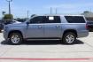 2016 Gray Chevrolet Suburban LT (1GNSCHKCXGR) with an EcoTec3 5.3L V-8 gasoline direct injection engine, located at 2401 E Main St., Grand Prairie, TX, 75050, (972) 262-4440, 32.748981, -96.969643 - Photo#2