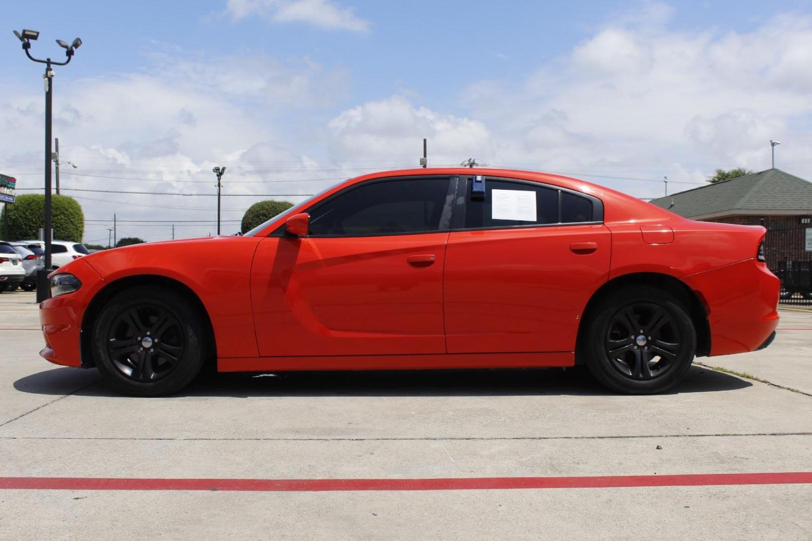 2020 Orange Dodge Charger SXT RWD (2C3CDXBG1LH) with an Pentastar 3.6L V-6 DOHC engine, located at 2401 E Main St., Grand Prairie, TX, 75050, (972) 262-4440, 32.748981, -96.969643 - Photo#2