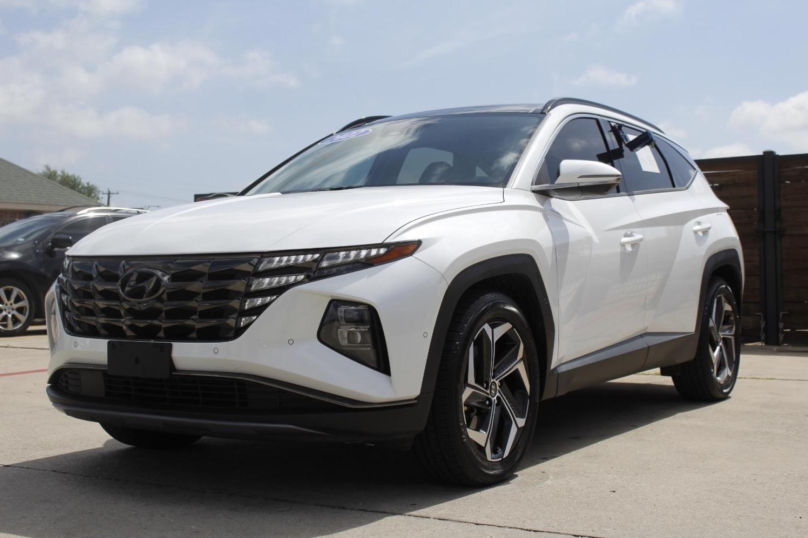 2022 White Hyundai Tucson Limited (5NMJE3AE5NH) with an Smartstream 2.5L I-4 port/direct injection engine, located at 2401 E Main St., Grand Prairie, TX, 75050, (972) 262-4440, 32.748981, -96.969643 - Photo#1