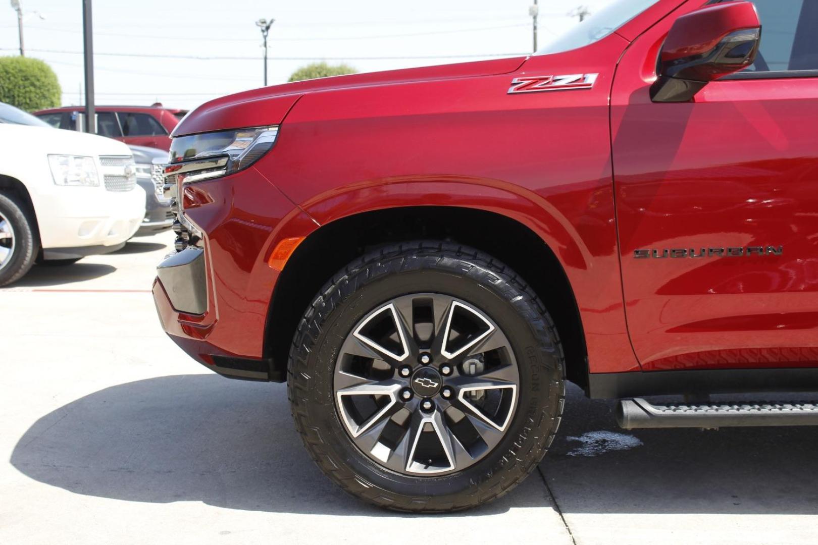 2021 Red Chevrolet Suburban 4WD Z71 (1GNSKDKD5MR) with an EcoTec3 5.3L V-8 gasoline direct injection engine, located at 2401 E Main St., Grand Prairie, TX, 75050, (972) 262-4440, 32.748981, -96.969643 - Photo#3