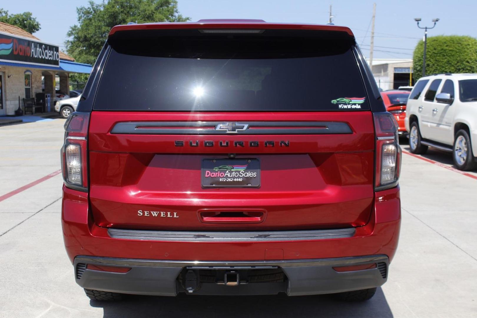 2021 Red Chevrolet Suburban 4WD Z71 (1GNSKDKD5MR) with an EcoTec3 5.3L V-8 gasoline direct injection engine, located at 2401 E Main St., Grand Prairie, TX, 75050, (972) 262-4440, 32.748981, -96.969643 - Photo#5