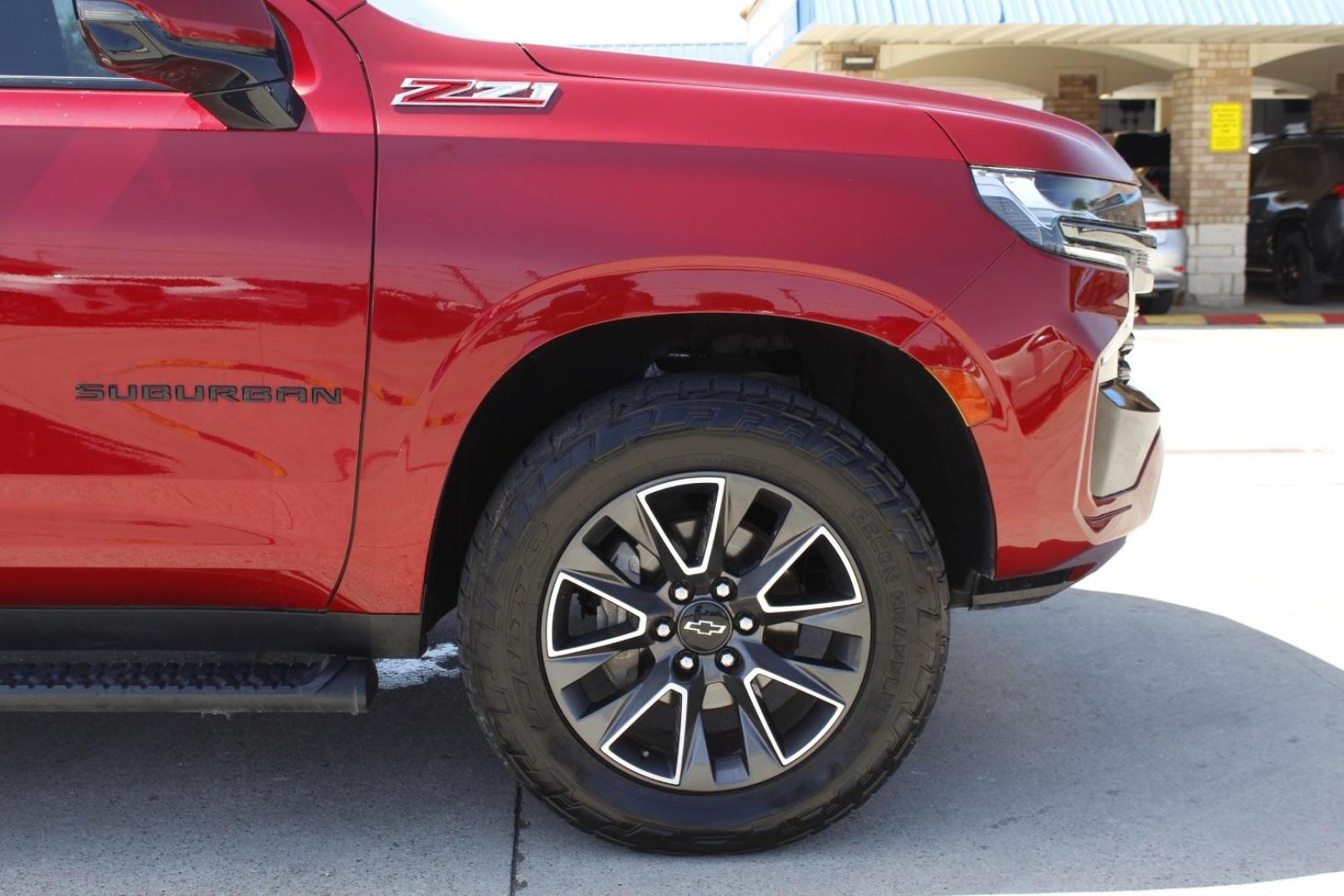 2021 Red Chevrolet Suburban 4WD Z71 (1GNSKDKD5MR) with an EcoTec3 5.3L V-8 gasoline direct injection engine, located at 2401 E Main St., Grand Prairie, TX, 75050, (972) 262-4440, 32.748981, -96.969643 - Photo#8