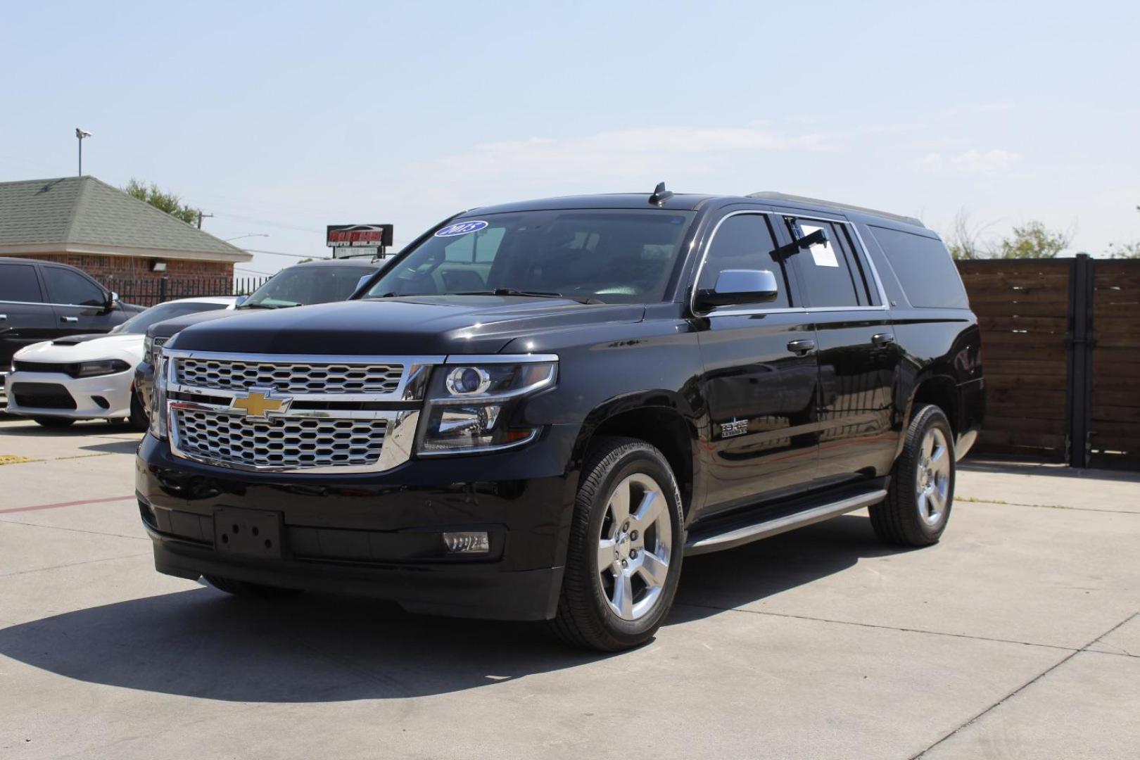 2015 Black Chevrolet Suburban 1500 LT (1GNSCJKC5FR) with an EcoTec3 5.3L V-8 gasoline direct injection engine, located at 2401 E Main St., Grand Prairie, TX, 75050, (972) 262-4440, 32.748981, -96.969643 - Photo#2