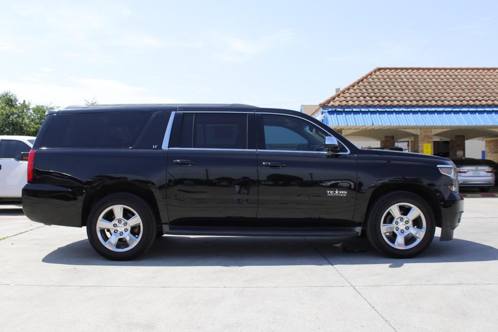 2015 Black Chevrolet Suburban 1500 LT (1GNSCJKC5FR) with an EcoTec3 5.3L V-8 gasoline direct injection engine, located at 2401 E Main St., Grand Prairie, TX, 75050, (972) 262-4440, 32.748981, -96.969643 - Photo#8