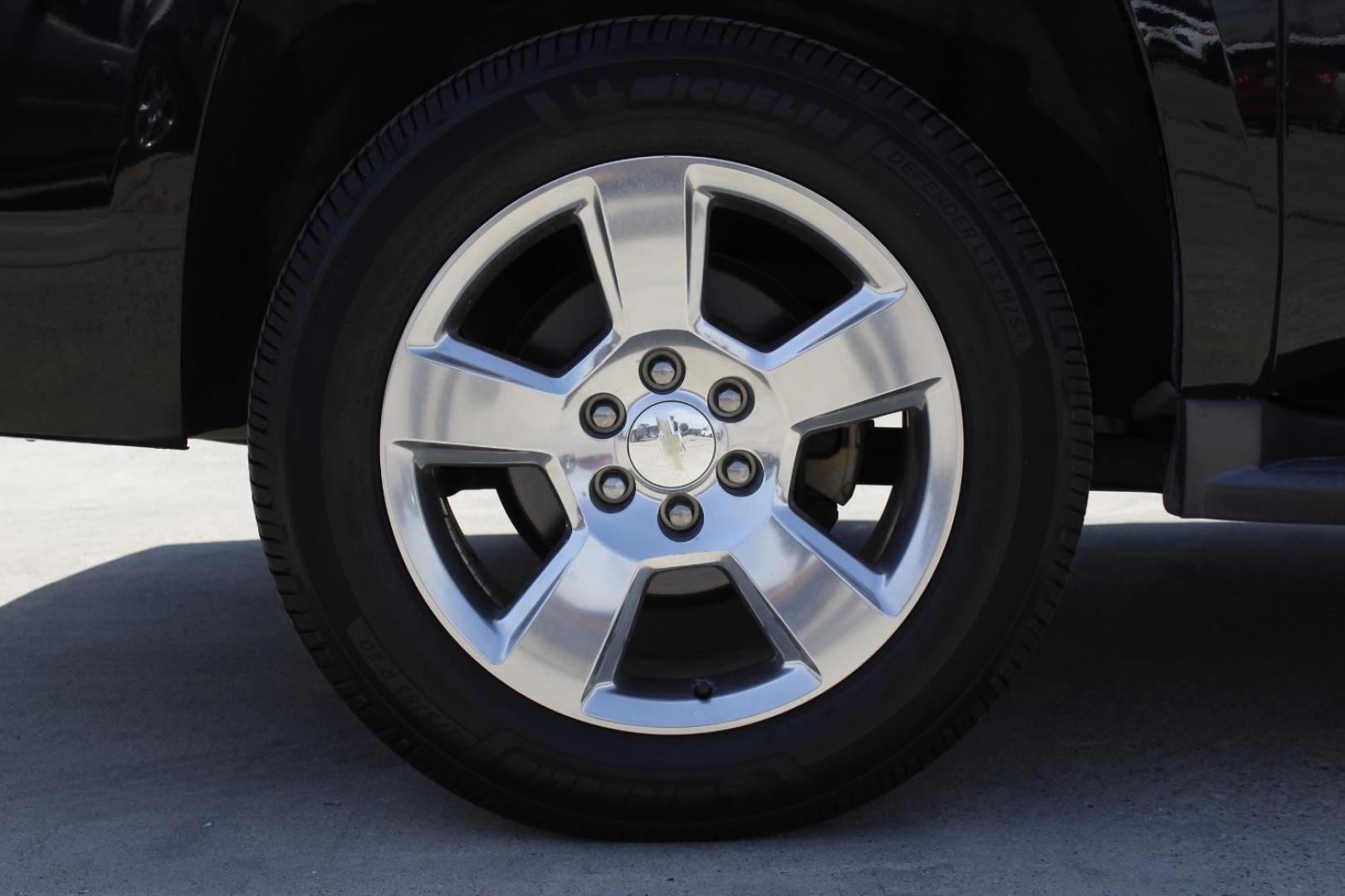 2015 Black Chevrolet Suburban 1500 (1GNSCJKC5FR) with an EcoTec3 5.3L V-8 gasoline direct injection engine, located at 2401 E Main St., Grand Prairie, TX, 75050, (972) 262-4440, 32.748981, -96.969643 - Photo#2