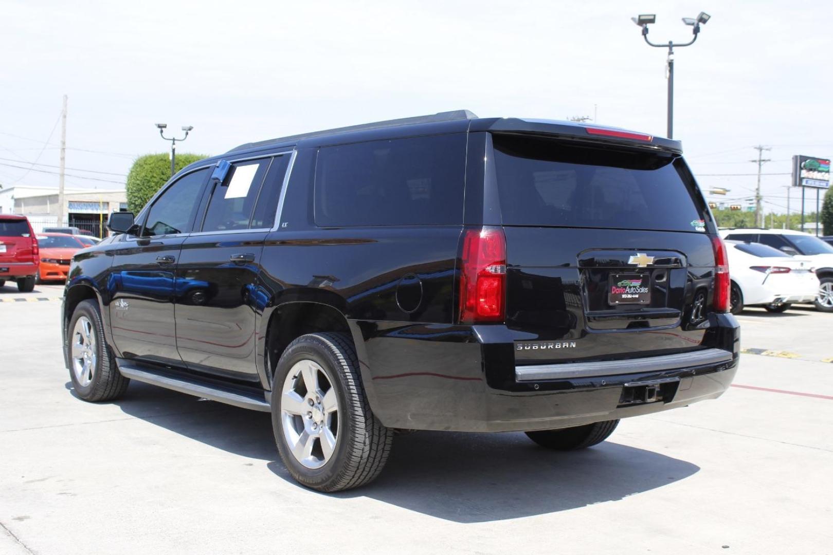 2015 Black Chevrolet Suburban 1500 (1GNSCJKC5FR) with an EcoTec3 5.3L V-8 gasoline direct injection engine, located at 2401 E Main St., Grand Prairie, TX, 75050, (972) 262-4440, 32.748981, -96.969643 - Photo#18