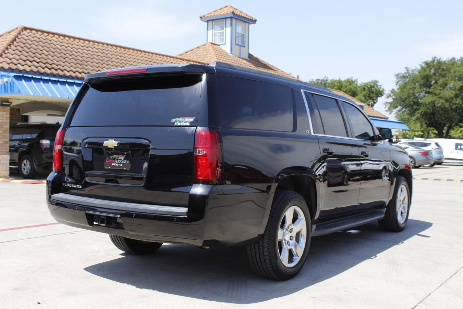 2015 Black Chevrolet Suburban 1500 (1GNSCJKC5FR) with an EcoTec3 5.3L V-8 gasoline direct injection engine, located at 2401 E Main St., Grand Prairie, TX, 75050, (972) 262-4440, 32.748981, -96.969643 - Photo#19
