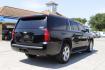 2015 Black Chevrolet Suburban 1500 (1GNSCJKC5FR) with an EcoTec3 5.3L V-8 gasoline direct injection engine, located at 2401 E Main St., Grand Prairie, TX, 75050, (972) 262-4440, 32.748981, -96.969643 - Photo#19