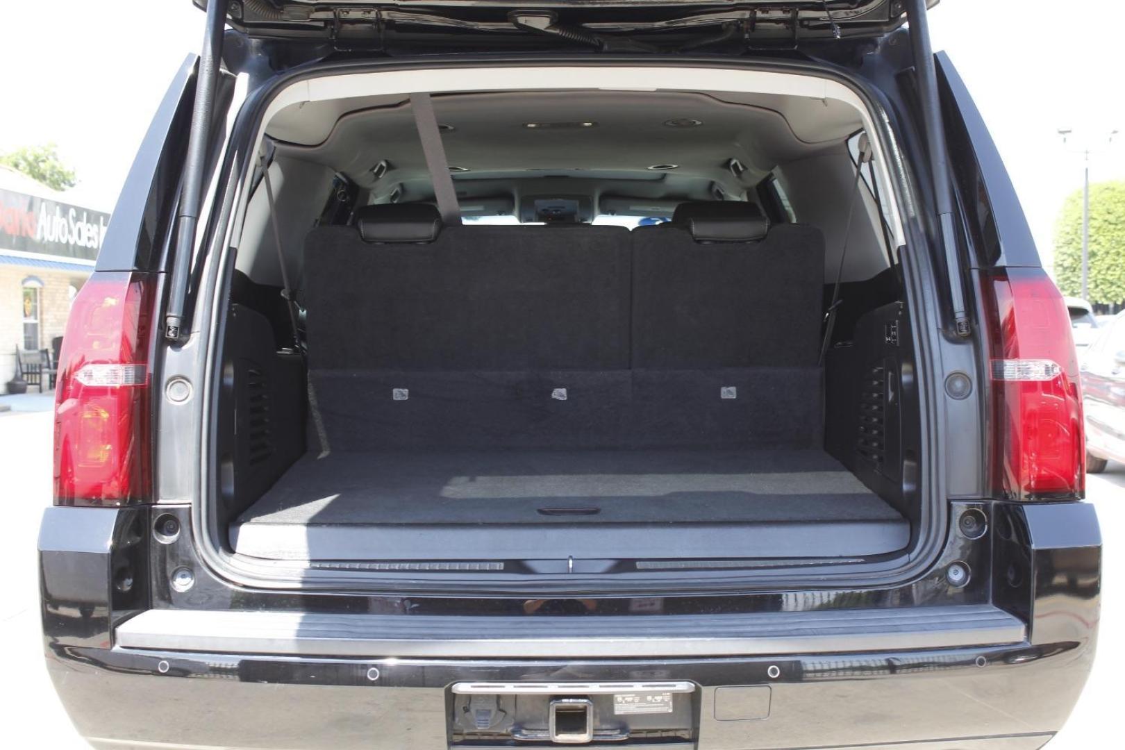 2015 Black Chevrolet Suburban 1500 (1GNSCJKC5FR) with an EcoTec3 5.3L V-8 gasoline direct injection engine, located at 2401 E Main St., Grand Prairie, TX, 75050, (972) 262-4440, 32.748981, -96.969643 - Photo#20