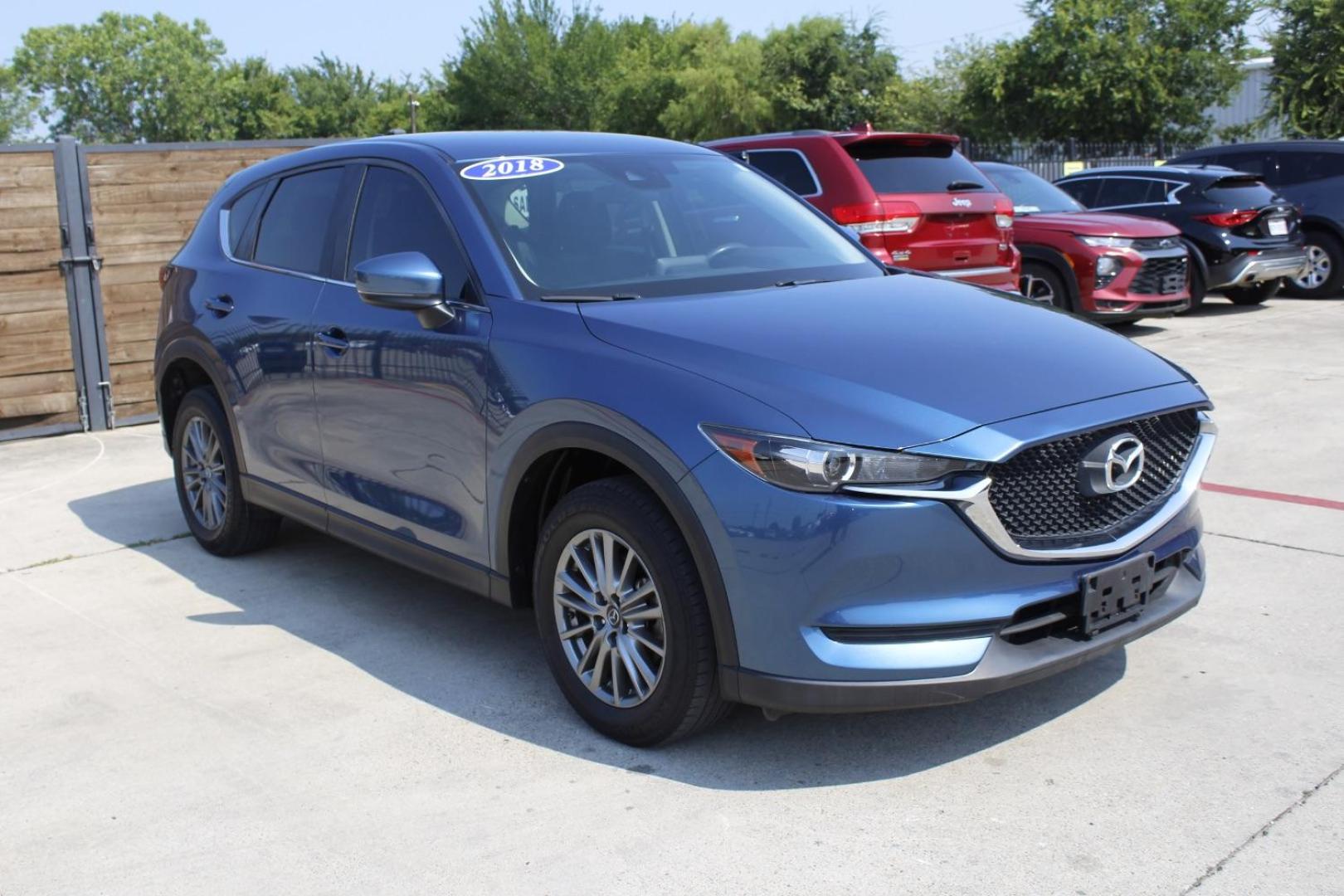 2018 Blue Mazda CX-5 Sport (JM3KFABM6J1) with an SKYACTIV-G 2.5L I-4 gasoline direct injection engine, located at 2401 E Main St., Grand Prairie, TX, 75050, (972) 262-4440, 32.748981, -96.969643 - Photo#1
