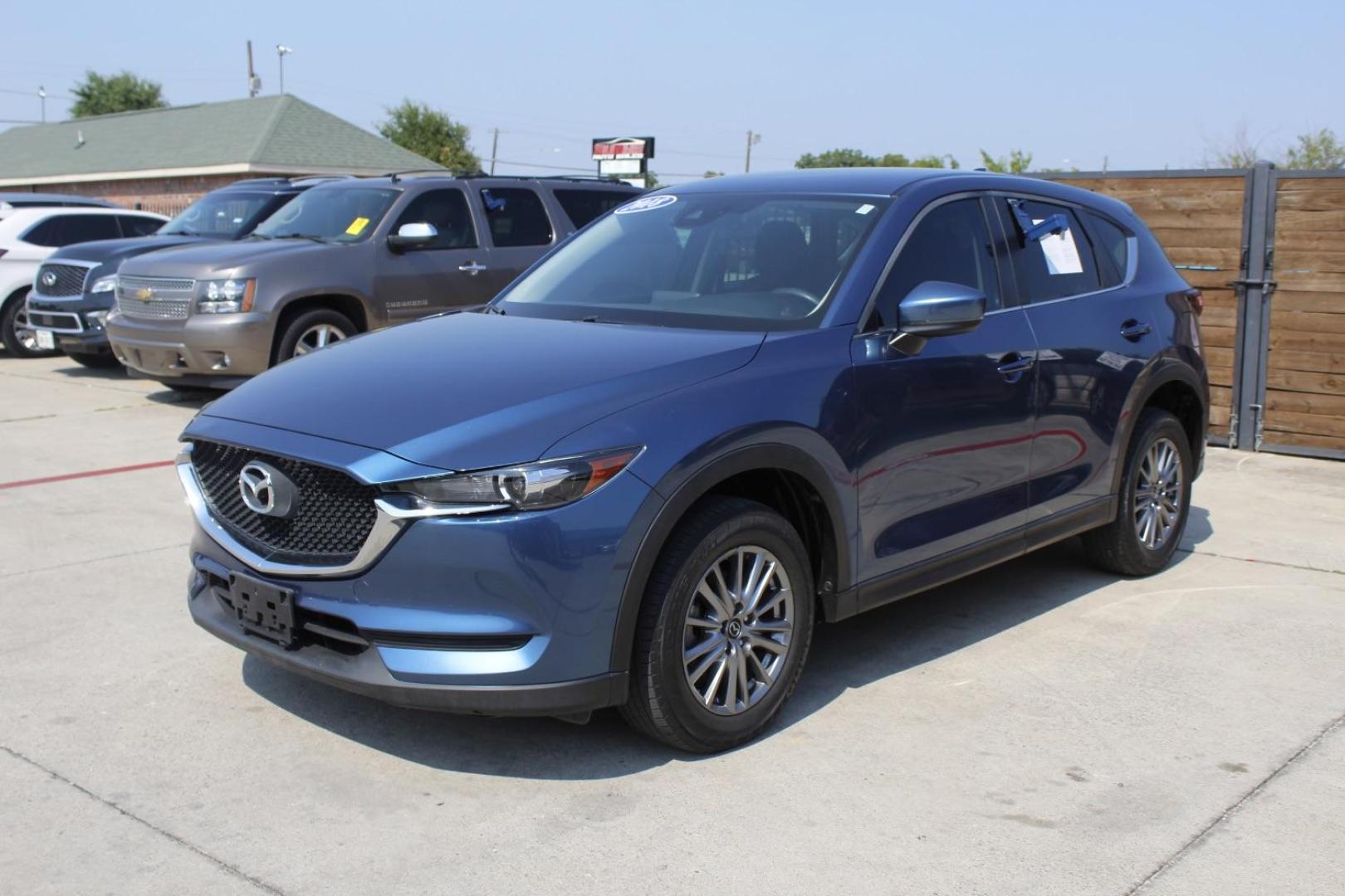 2018 Blue Mazda CX-5 Sport (JM3KFABM6J1) with an SKYACTIV-G 2.5L I-4 gasoline direct injection engine, located at 2401 E Main St., Grand Prairie, TX, 75050, (972) 262-4440, 32.748981, -96.969643 - Photo#2