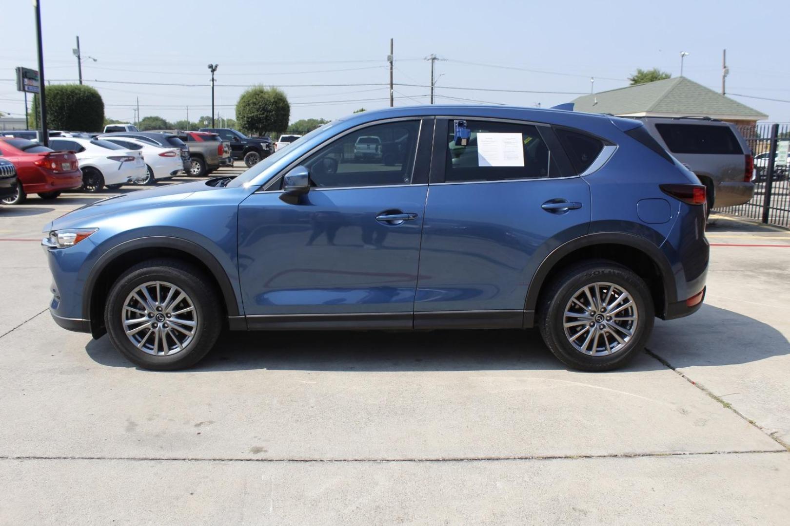 2018 Blue Mazda CX-5 Sport (JM3KFABM6J1) with an SKYACTIV-G 2.5L I-4 gasoline direct injection engine, located at 2401 E Main St., Grand Prairie, TX, 75050, (972) 262-4440, 32.748981, -96.969643 - Photo#4