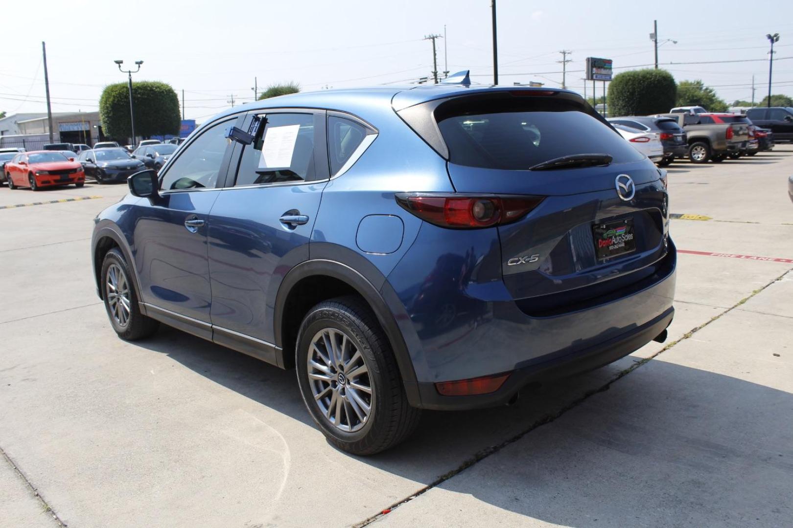 2018 Blue Mazda CX-5 Sport (JM3KFABM6J1) with an SKYACTIV-G 2.5L I-4 gasoline direct injection engine, located at 2401 E Main St., Grand Prairie, TX, 75050, (972) 262-4440, 32.748981, -96.969643 - Photo#5