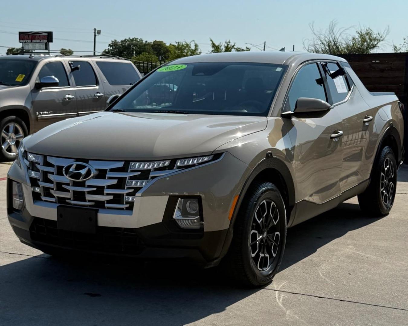 2023 Tan Hyundai Santa Cruz SEL (5NTJBDAE7PH) with an Smartstream 2.5L I-4 port/direct injection engine, located at 2401 E Main St., Grand Prairie, TX, 75050, (972) 262-4440, 32.748981, -96.969643 - Photo#1