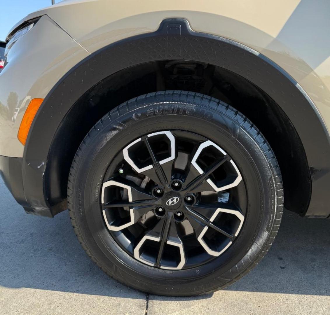 2023 Tan Hyundai Santa Cruz SEL (5NTJBDAE7PH) with an Smartstream 2.5L I-4 port/direct injection engine, located at 2401 E Main St., Grand Prairie, TX, 75050, (972) 262-4440, 32.748981, -96.969643 - Photo#7