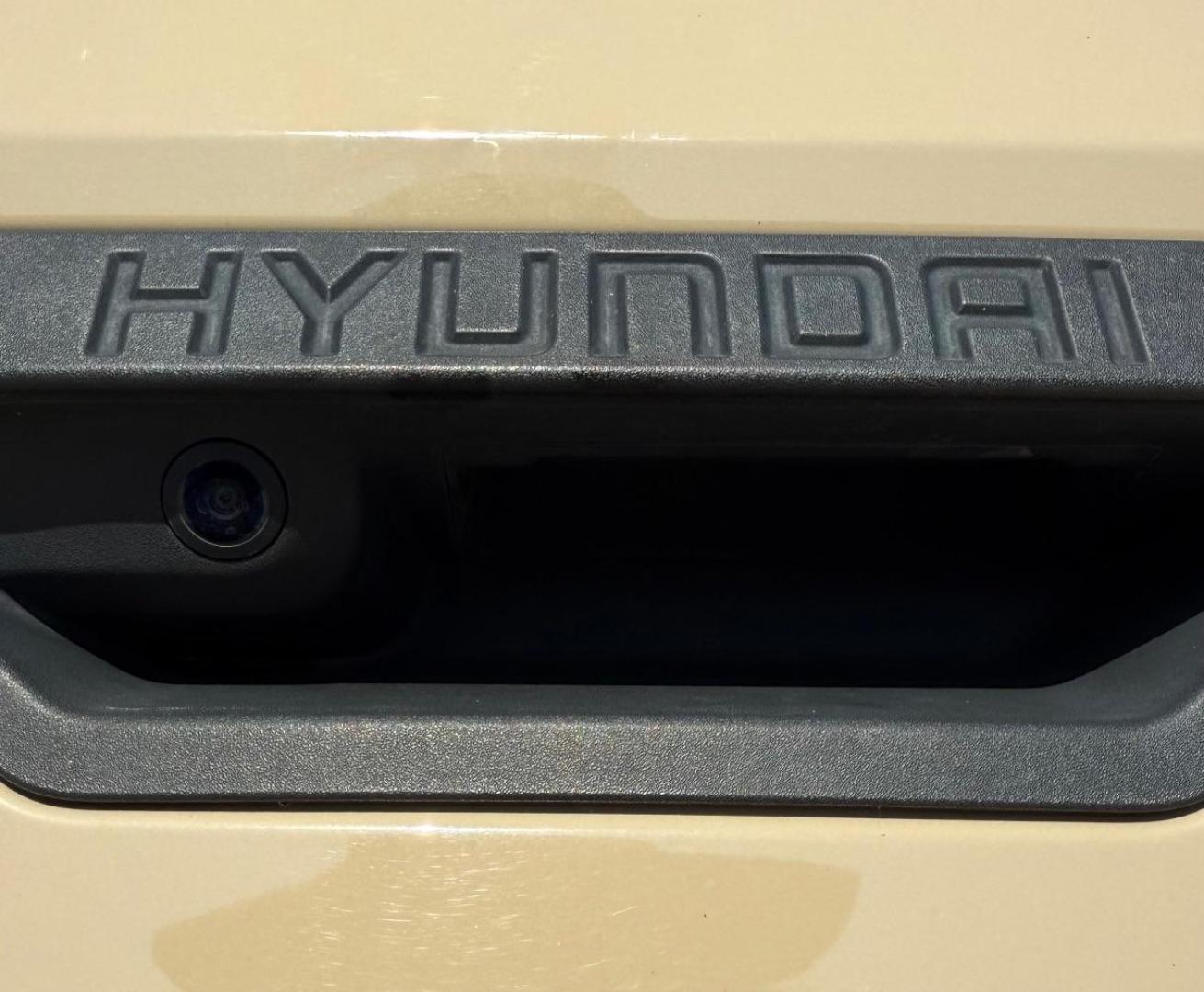 2023 Tan Hyundai Santa Cruz SEL (5NTJBDAE7PH) with an Smartstream 2.5L I-4 port/direct injection engine, located at 2401 E Main St., Grand Prairie, TX, 75050, (972) 262-4440, 32.748981, -96.969643 - Photo#21