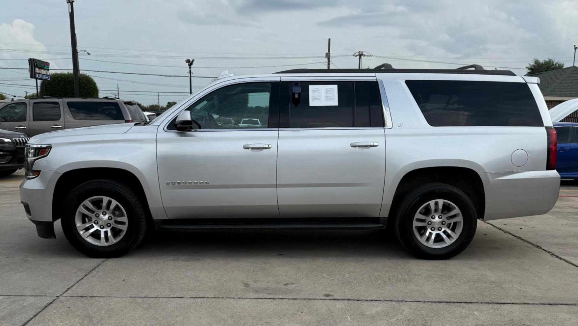 2018 Silver Chevrolet Suburban LT (1GNSCHKC3JR) with an EcoTec3 5.3L V-8 gasoline direct injection engine, located at 2401 E Main St., Grand Prairie, TX, 75050, (972) 262-4440, 32.748981, -96.969643 - Photo#2