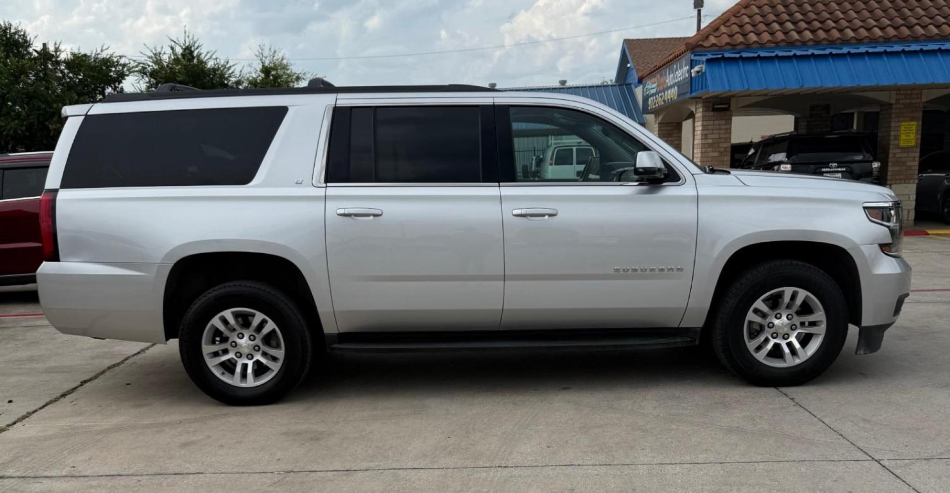 2018 Silver Chevrolet Suburban LT (1GNSCHKC3JR) with an EcoTec3 5.3L V-8 gasoline direct injection engine, located at 2401 E Main St., Grand Prairie, TX, 75050, (972) 262-4440, 32.748981, -96.969643 - Photo#9