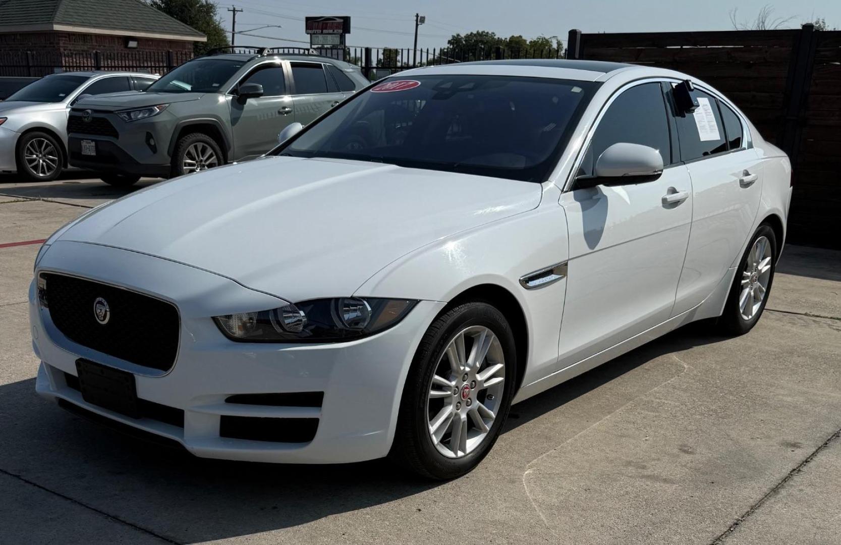 2017 White Jaguar XE 25t Premium (SAJAD4BG1HA) with an 2L I-4 gasoline direct injection engine, located at 2401 E Main St., Grand Prairie, TX, 75050, (972) 262-4440, 32.748981, -96.969643 - Photo#1