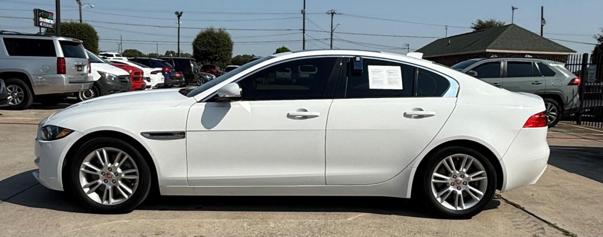 2017 White Jaguar XE 25t Premium (SAJAD4BG1HA) with an 2L I-4 gasoline direct injection engine, located at 2401 E Main St., Grand Prairie, TX, 75050, (972) 262-4440, 32.748981, -96.969643 - Photo#2
