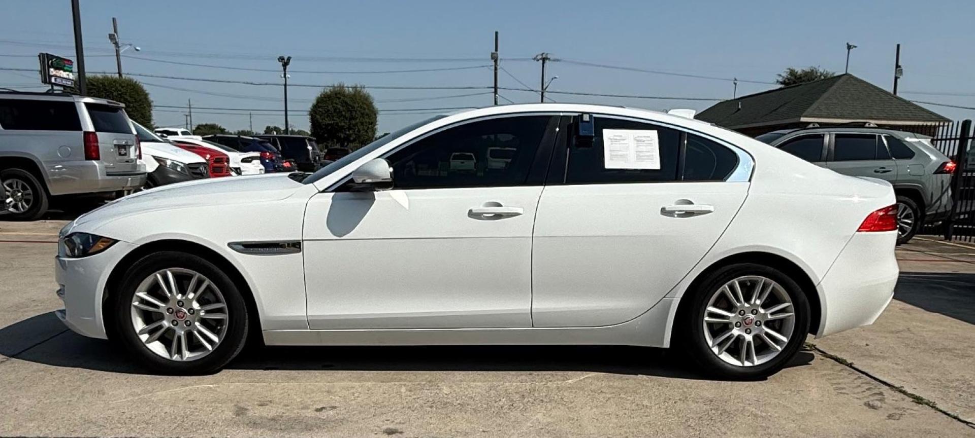 2017 White Jaguar XE 25t Premium (SAJAD4BG1HA) with an 2L I-4 gasoline direct injection engine, located at 2401 E Main St., Grand Prairie, TX, 75050, (972) 262-4440, 32.748981, -96.969643 - Photo#3