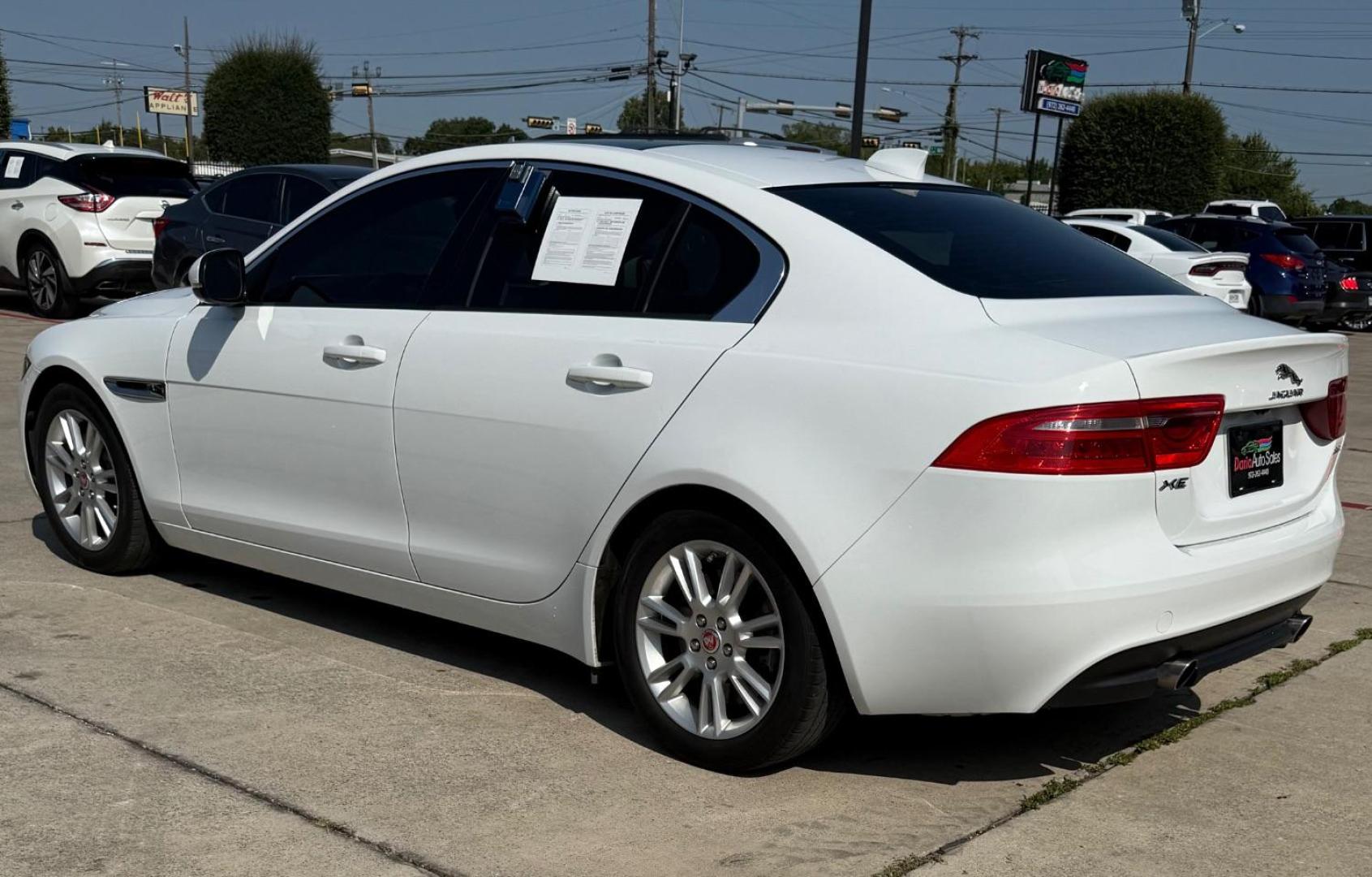 2017 White Jaguar XE 25t Premium (SAJAD4BG1HA) with an 2L I-4 gasoline direct injection engine, located at 2401 E Main St., Grand Prairie, TX, 75050, (972) 262-4440, 32.748981, -96.969643 - Photo#4