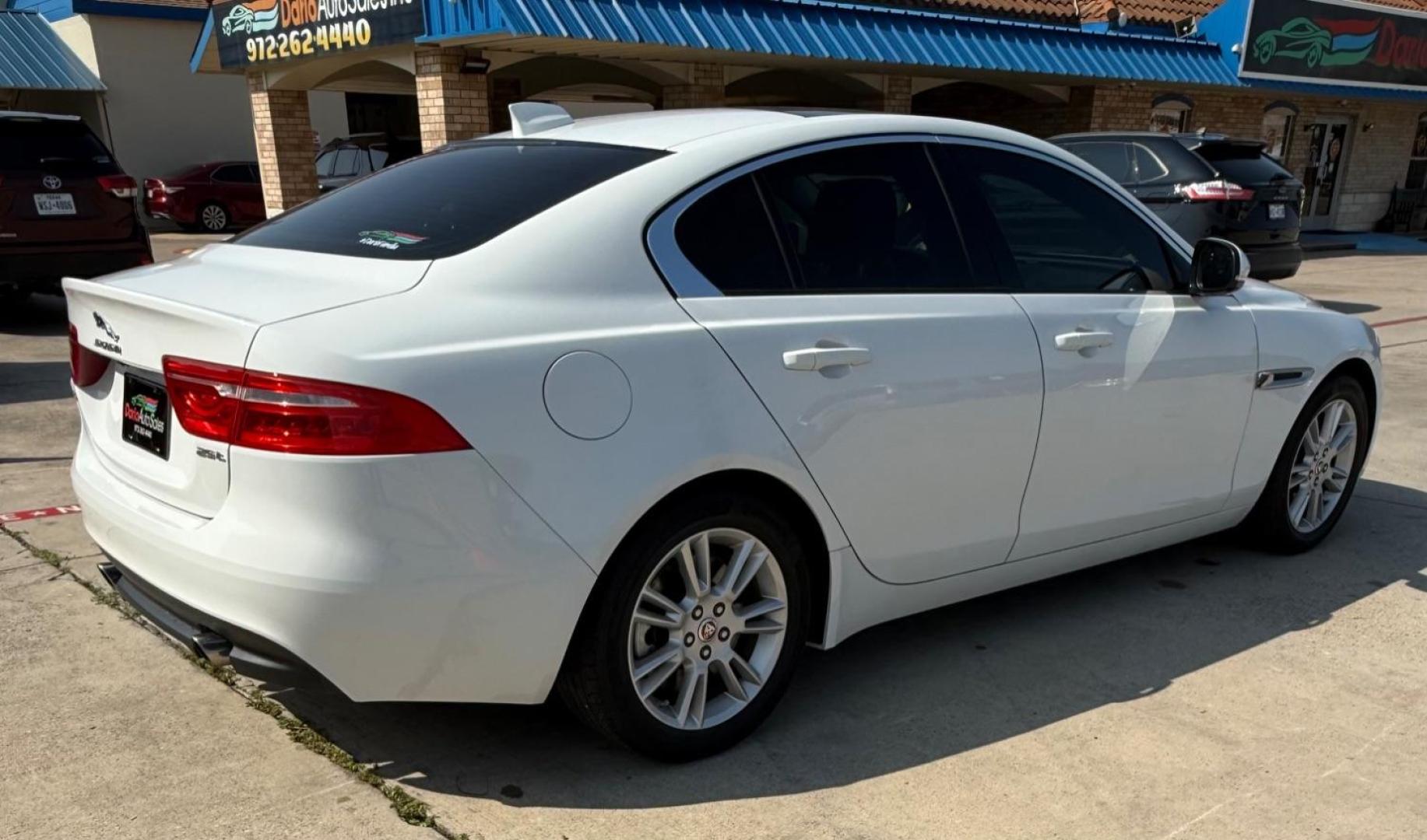 2017 White Jaguar XE 25t Premium (SAJAD4BG1HA) with an 2L I-4 gasoline direct injection engine, located at 2401 E Main St., Grand Prairie, TX, 75050, (972) 262-4440, 32.748981, -96.969643 - Photo#7