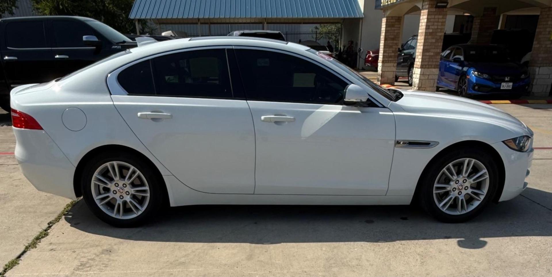 2017 White Jaguar XE 25t Premium (SAJAD4BG1HA) with an 2L I-4 gasoline direct injection engine, located at 2401 E Main St., Grand Prairie, TX, 75050, (972) 262-4440, 32.748981, -96.969643 - Photo#9