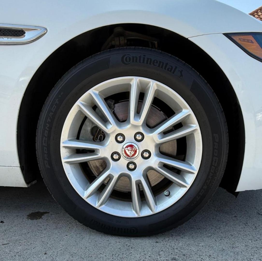 2017 White Jaguar XE 25t Premium (SAJAD4BG1HA) with an 2L I-4 gasoline direct injection engine, located at 2401 E Main St., Grand Prairie, TX, 75050, (972) 262-4440, 32.748981, -96.969643 - Photo#10