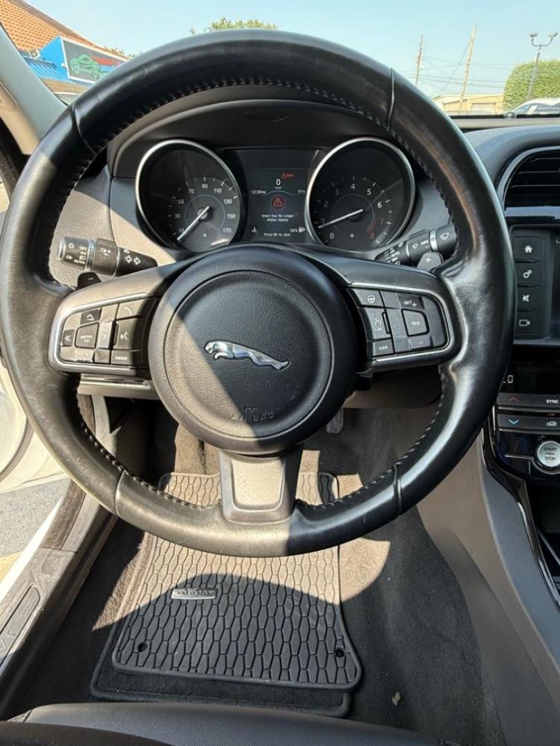 2017 White Jaguar XE 25t Premium (SAJAD4BG1HA) with an 2L I-4 gasoline direct injection engine, located at 2401 E Main St., Grand Prairie, TX, 75050, (972) 262-4440, 32.748981, -96.969643 - Photo#16