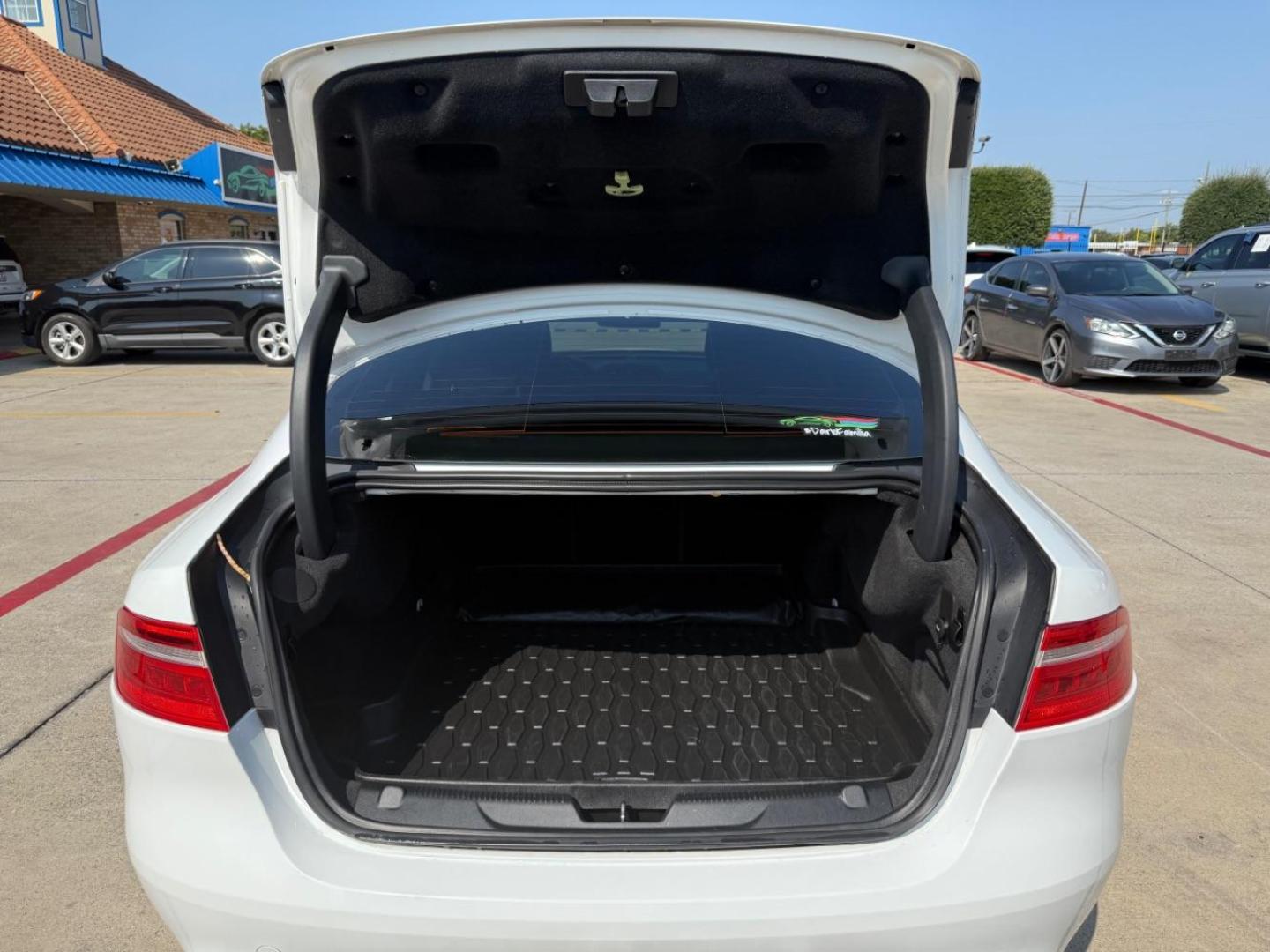 2017 White Jaguar XE 25t Premium (SAJAD4BG1HA) with an 2L I-4 gasoline direct injection engine, located at 2401 E Main St., Grand Prairie, TX, 75050, (972) 262-4440, 32.748981, -96.969643 - Photo#28