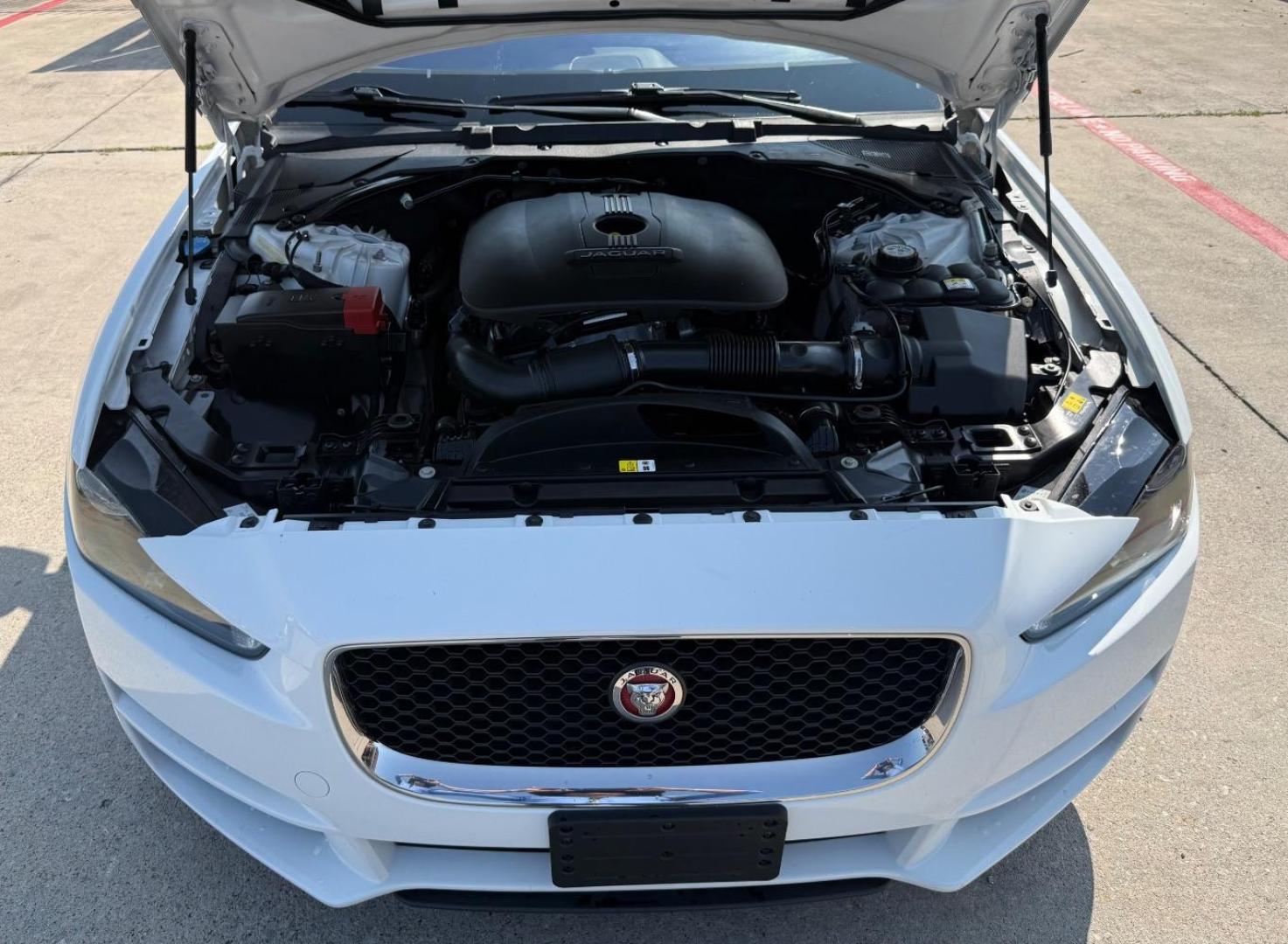 2017 White Jaguar XE 25t Premium (SAJAD4BG1HA) with an 2L I-4 gasoline direct injection engine, located at 2401 E Main St., Grand Prairie, TX, 75050, (972) 262-4440, 32.748981, -96.969643 - Photo#32