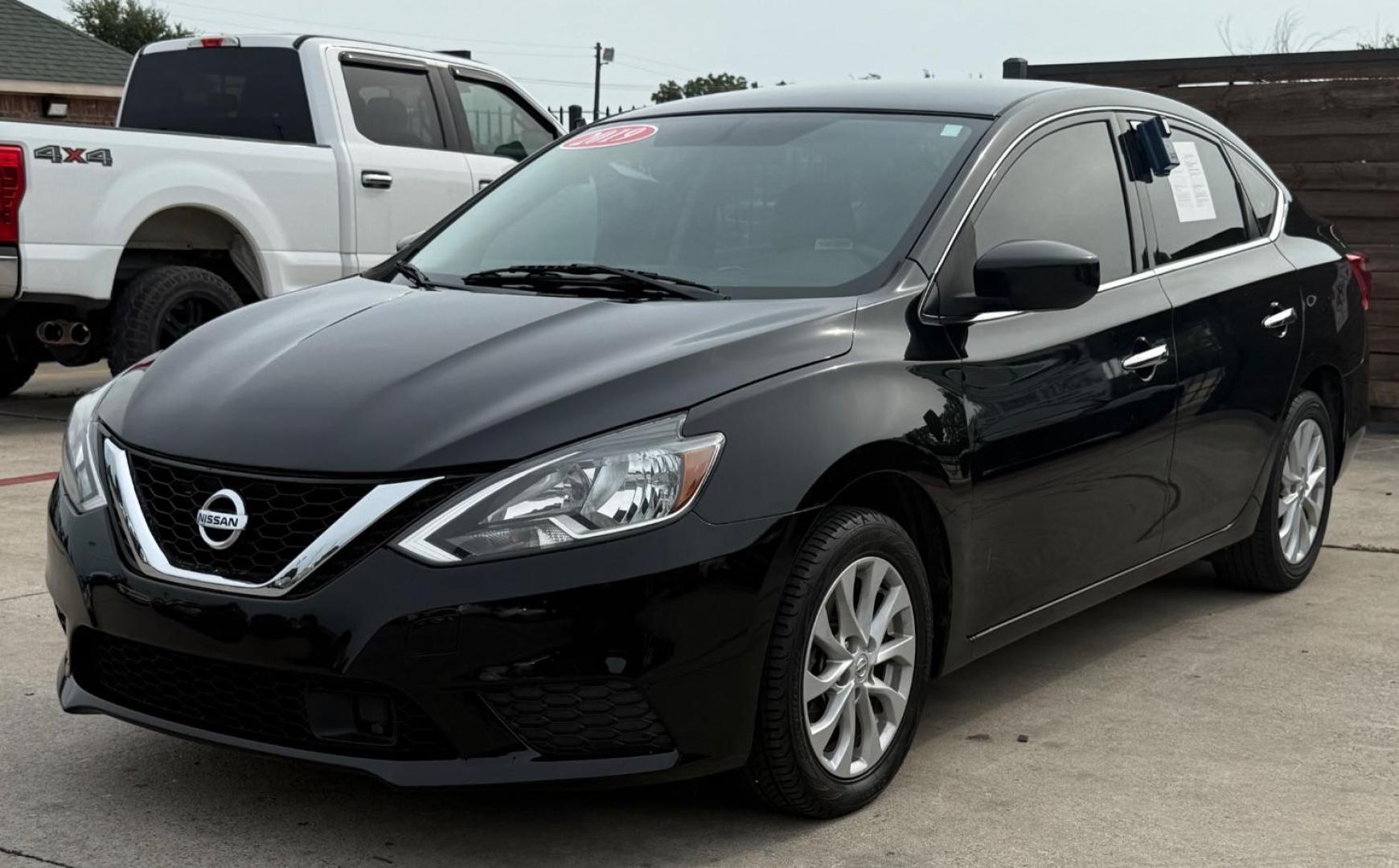 2019 Black Nissan Sentra SV (3N1AB7AP8KY) with an 1.8L I-4 DOHC engine, located at 2401 E Main St., Grand Prairie, TX, 75050, (972) 262-4440, 32.748981, -96.969643 - Photo#1