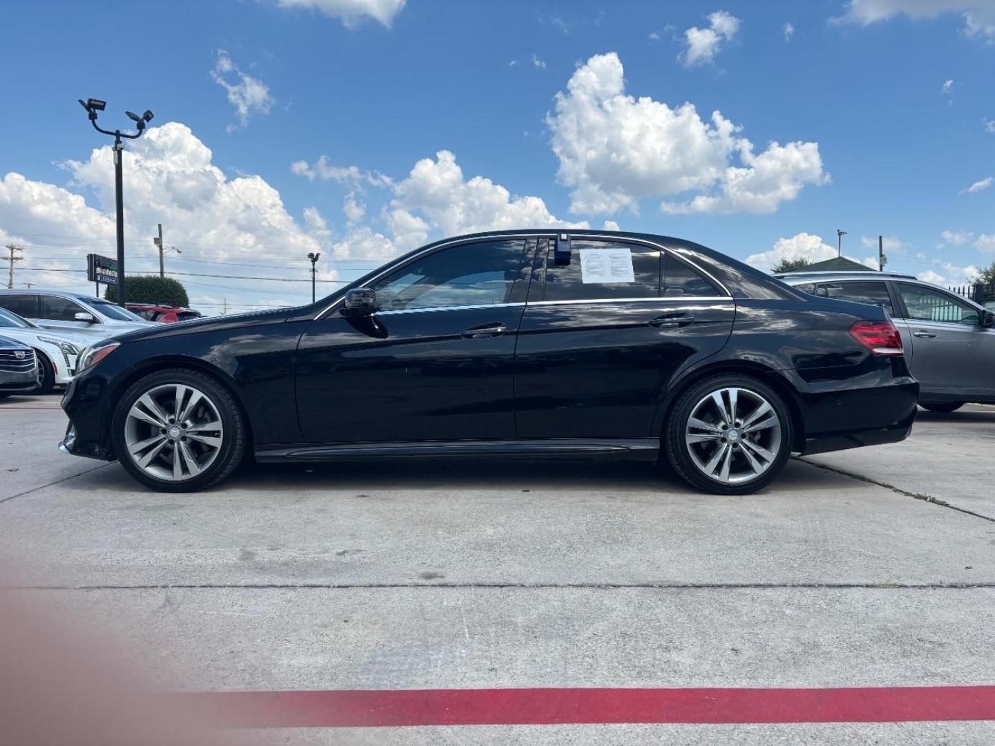 2014 Black Mercedes-Benz E 350 s (WDDHF5KB2EB) with an 3.5 6cyl engine, located at 2401 E Main St., Grand Prairie, TX, 75050, (972) 262-4440, 32.748981, -96.969643 - Photo#4