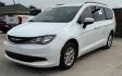 2021 White Chrysler Voyager LXI (2C4RC1DG0MR) with an 3.6L V-6 DOHC engine, located at 2401 E Main St., Grand Prairie, TX, 75050, (972) 262-4440, 32.748981, -96.969643 - Photo#1