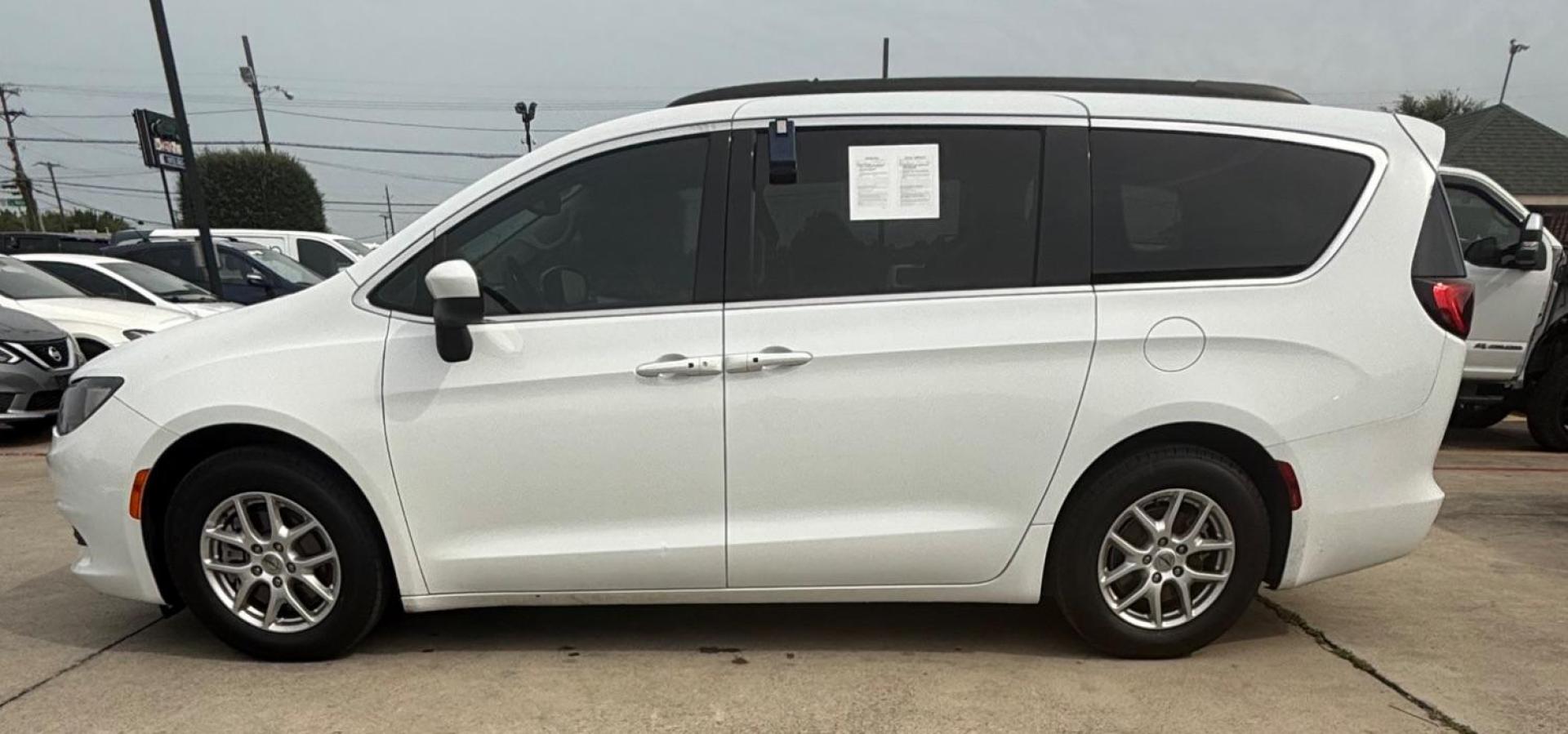 2021 White Chrysler Voyager LXI (2C4RC1DG0MR) with an 3.6L V-6 DOHC engine, located at 2401 E Main St., Grand Prairie, TX, 75050, (972) 262-4440, 32.748981, -96.969643 - Photo#2