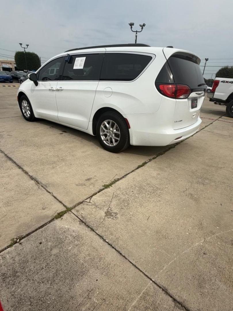 2021 White Chrysler Voyager LXI (2C4RC1DG0MR) with an 3.6L V-6 DOHC engine, located at 2401 E Main St., Grand Prairie, TX, 75050, (972) 262-4440, 32.748981, -96.969643 - Photo#3